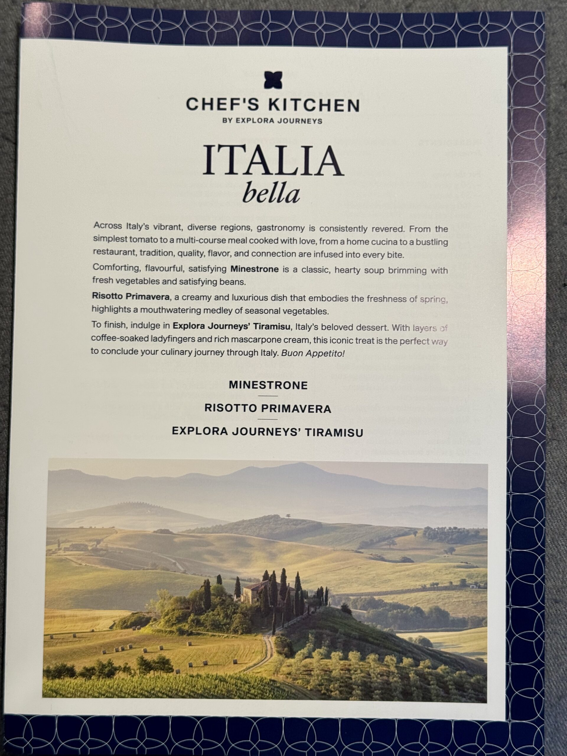Menu page for Italia bella at Chef's Kitchen, featuring a Tuscan landscape image at the bottom and dishes listed (Minestrone, Risotto Primavera, Tiramisu)